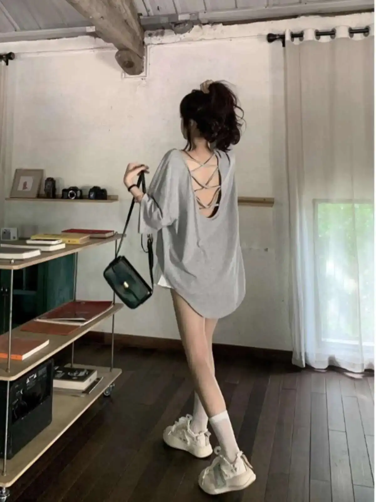 Sexy And Cautious Backless Short Sleeved T-shirt For Women In Spring 2025, New Lazy Style Casual Loose Mid Length Top
Sexy And Cautious Backless Short Sleeved T-shirt For Women In Spring 2025, New Lazy Style Casual Loose Mid Length Top