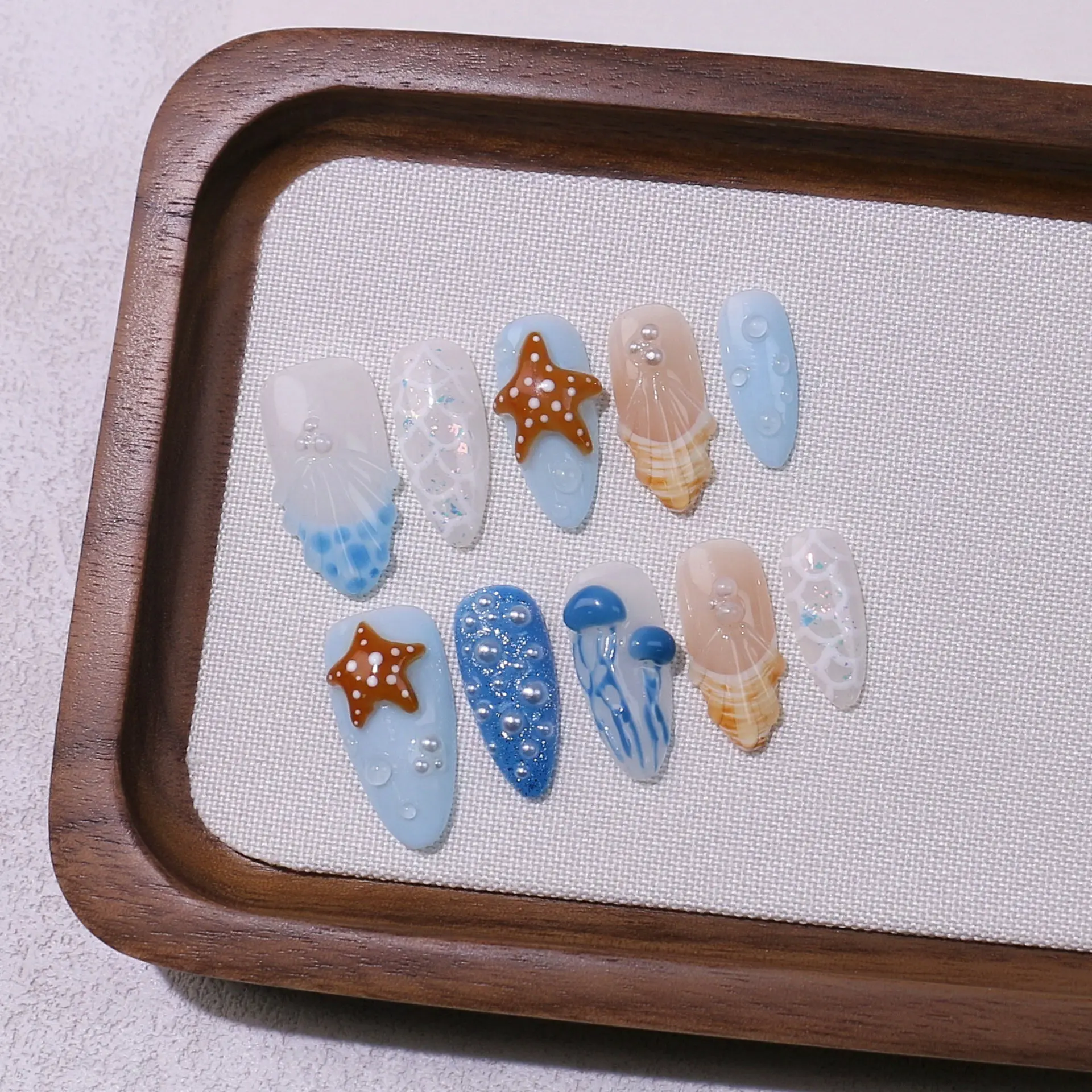 10Pcs Handmade French Press on Nails Ocean Starfish Pearl Design Cute Almond Fake Nails Wearable False Nail Tip
10Pcs Handmade French Press on Nails Ocean Starfish Pearl Design Cute Almond Fake Nails Wearable False Nail Tip