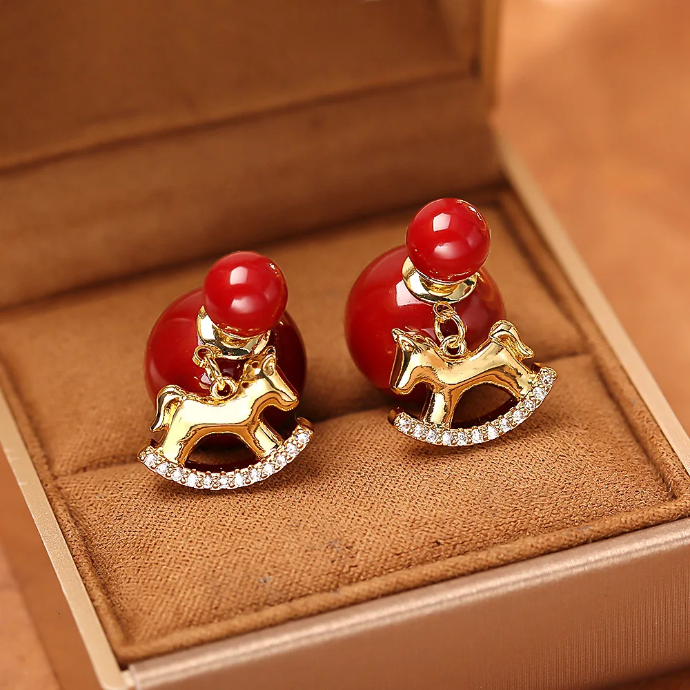 Stylish and exquisite red pony earrings, light luxury and high-end, zodiac year zircon earrings, niche design commuter earrings
Stylish and exquisite red pony earrings, light luxury and high-end, zodiac year zircon earrings, niche design commuter earrings