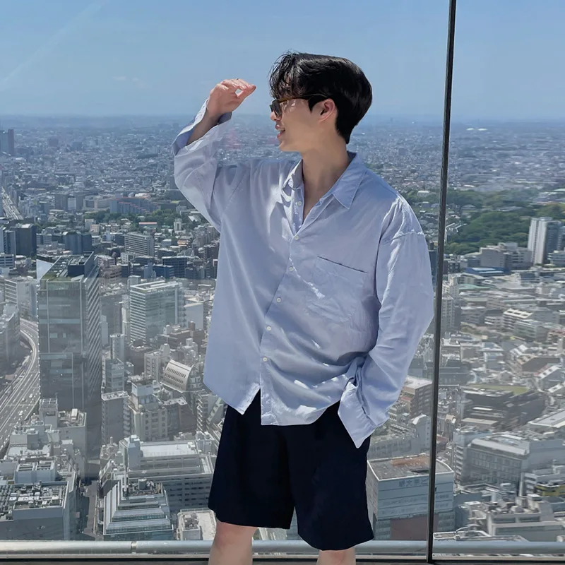 Spring Summer Korean Men's Light Blue Solid Color Casual Simple Basic Loose Daily Turn-down Collar Long Sleeve Shirts Male Tops
Spring Summer Korean Men's Light Blue Solid Color Casual Simple Basic Loose Daily Turn-down Collar Long Sleeve Shirts Male Tops