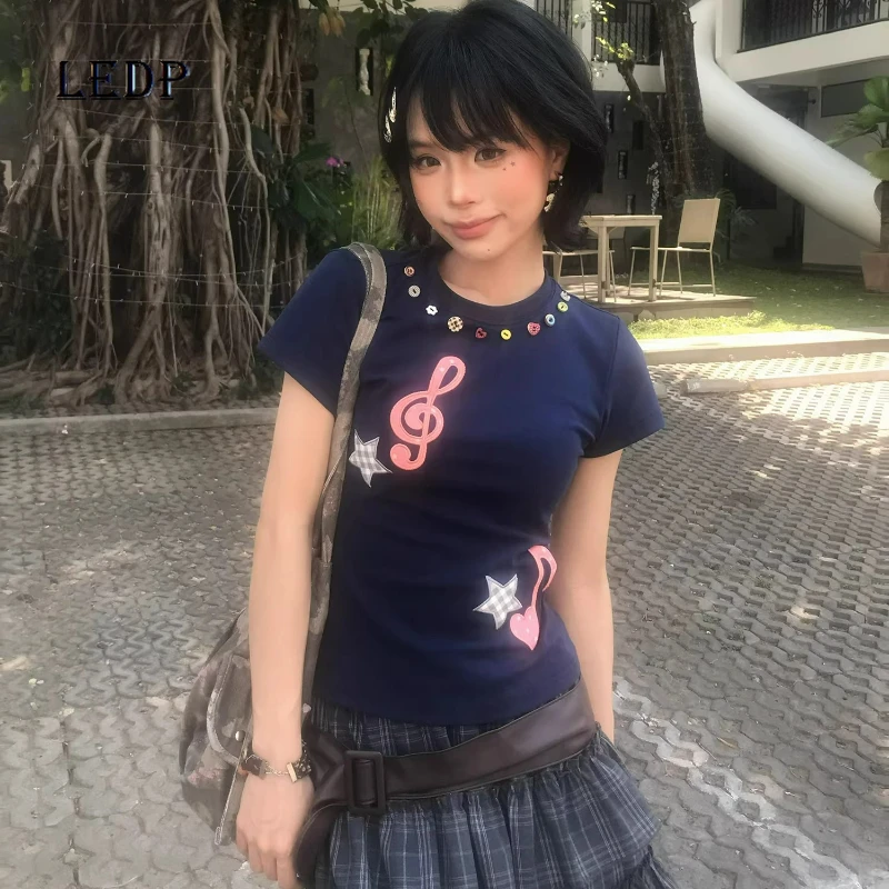 Original Music Note Embroidery Colored Button Women's Short-sleeved T-shirt 2026 Summer New Design Slimming Versatile Short Top
Original Music Note Embroidery Colored Button Women's Short-sleeved T-shirt 2026 Summer New Design Slimming Versatile Short Top