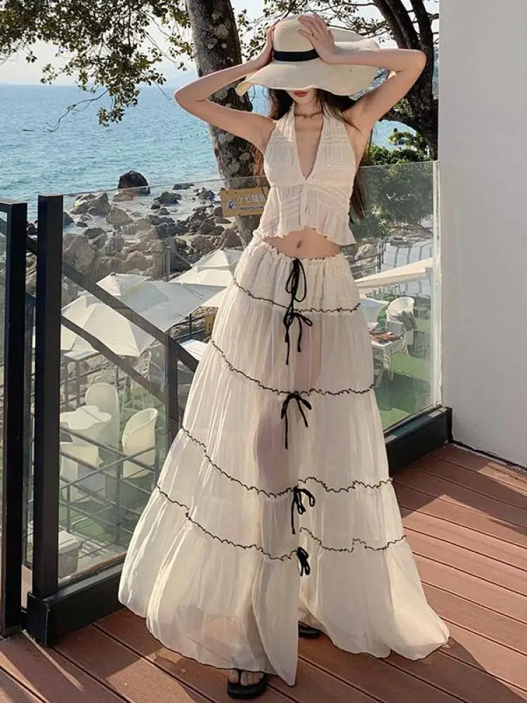 Summer Elegant Two Piece Set Women White Off Shoulder Backless Crop Halter Tops + High Waist Lace-up Pleated Long Skirt Trendy 
Summer Elegant Two Piece Set Women White Off Shoulder Backless Crop Halter Tops + High Waist Lace-up Pleated Long Skirt Trendy