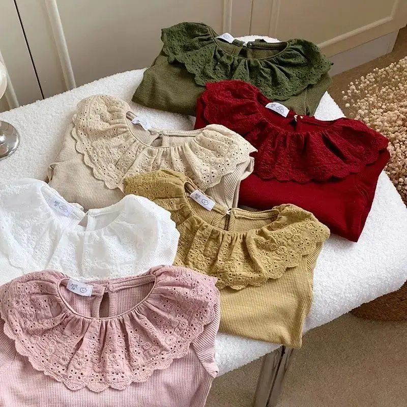 Girl's doll collar ruffle hem base shirt Spring and Autumn children's baby long sleeved T-shirt
Girl's doll collar ruffle hem base shirt Spring and Autumn children's baby long sleeved T-shirt