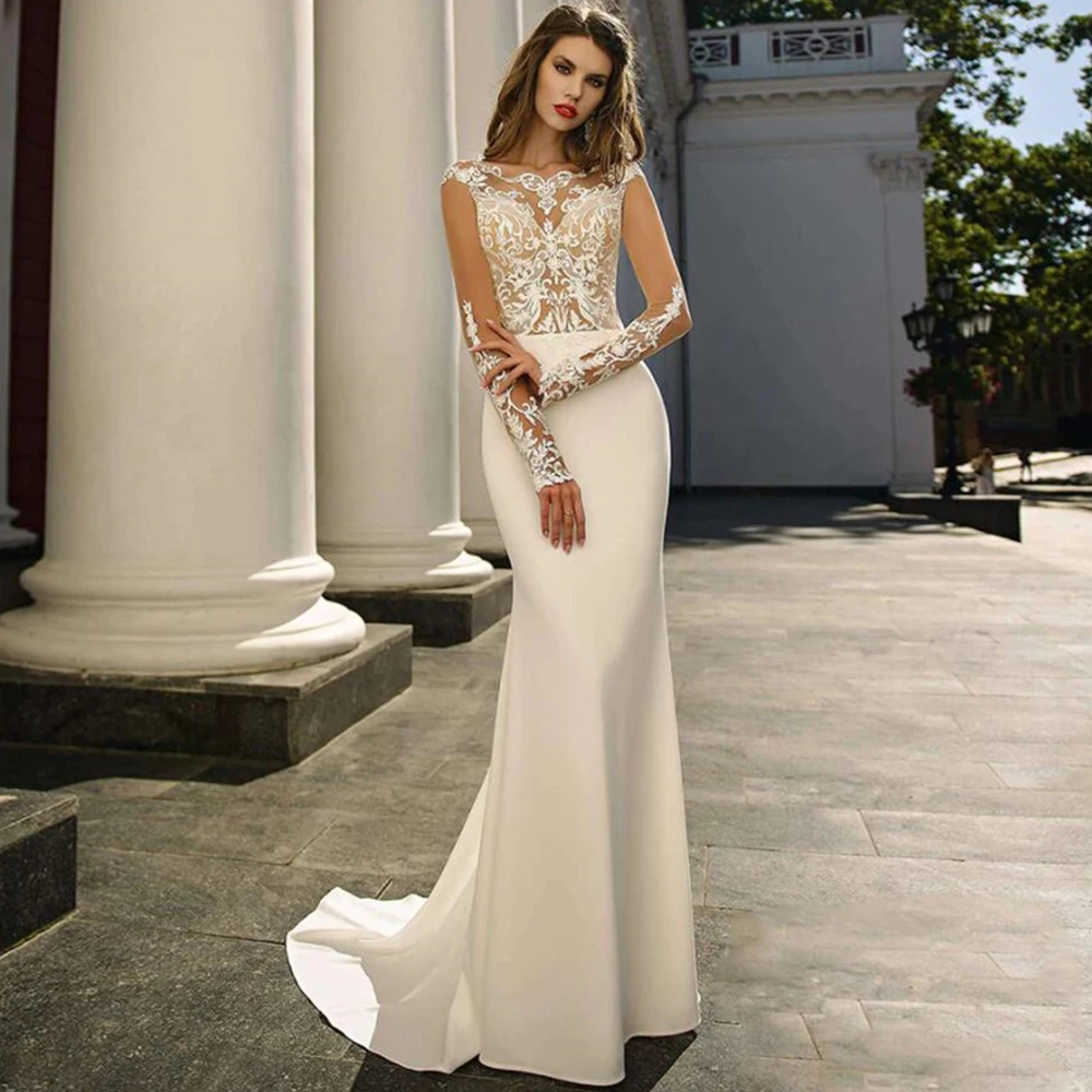 Classic Tulle Applique and Jersey Wedding Dress Sexy Illusion Long Sleeves and Back with Buttons Mermaid Floor Length Gowns
Classic Tulle Applique and Jersey Wedding Dress Sexy Illusion Long Sleeves and Back with Buttons Mermaid Floor Length Gowns