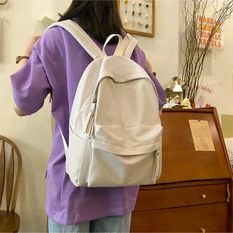 Waterproof Nylon Backpack for Women Simple Solid Color Bookbag Travel Backpack for Student Girls
Waterproof Nylon Backpack for Women Simple Solid Color Bookbag Travel Backpack for Student Girls