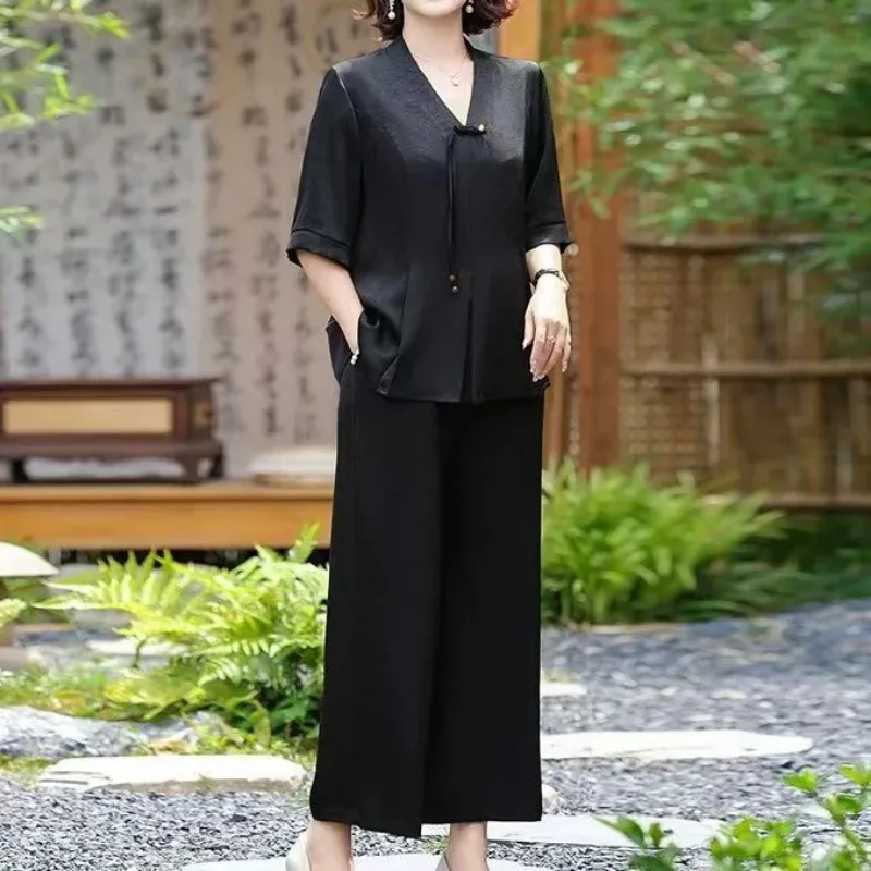 Middle Aged Women Chinese Style Two Piece Set V Neck Frog Button 3/4 Sleeve Top Wide Leg Pants Summer Outfit
Middle Aged Women Chinese Style Two Piece Set V Neck Frog Button 3/4 Sleeve Top Wide Leg Pants Summer Outfit