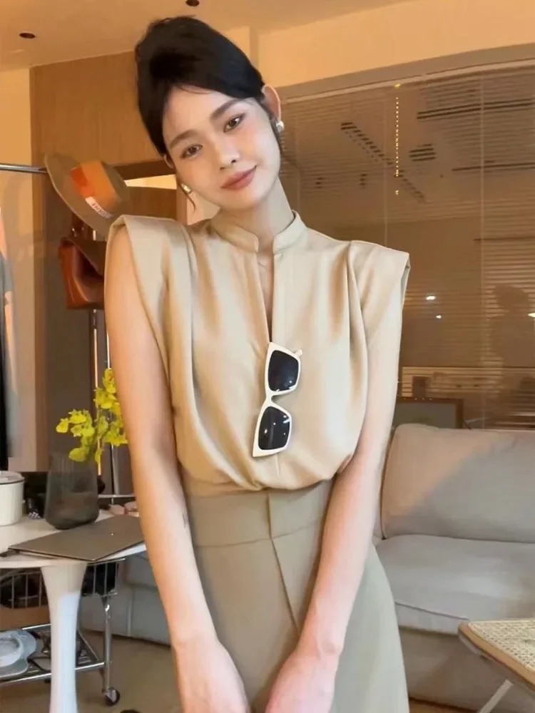 2025 Women Blouses V-neck Sleeveless Shirts Temperament Solid Color Crop Tops Summer Vintage All Match Blouse E6623
2025 Women Blouses V-neck Sleeveless Shirts Temperament Solid Color Crop Tops Summer Vintage All Match Blouse E6623