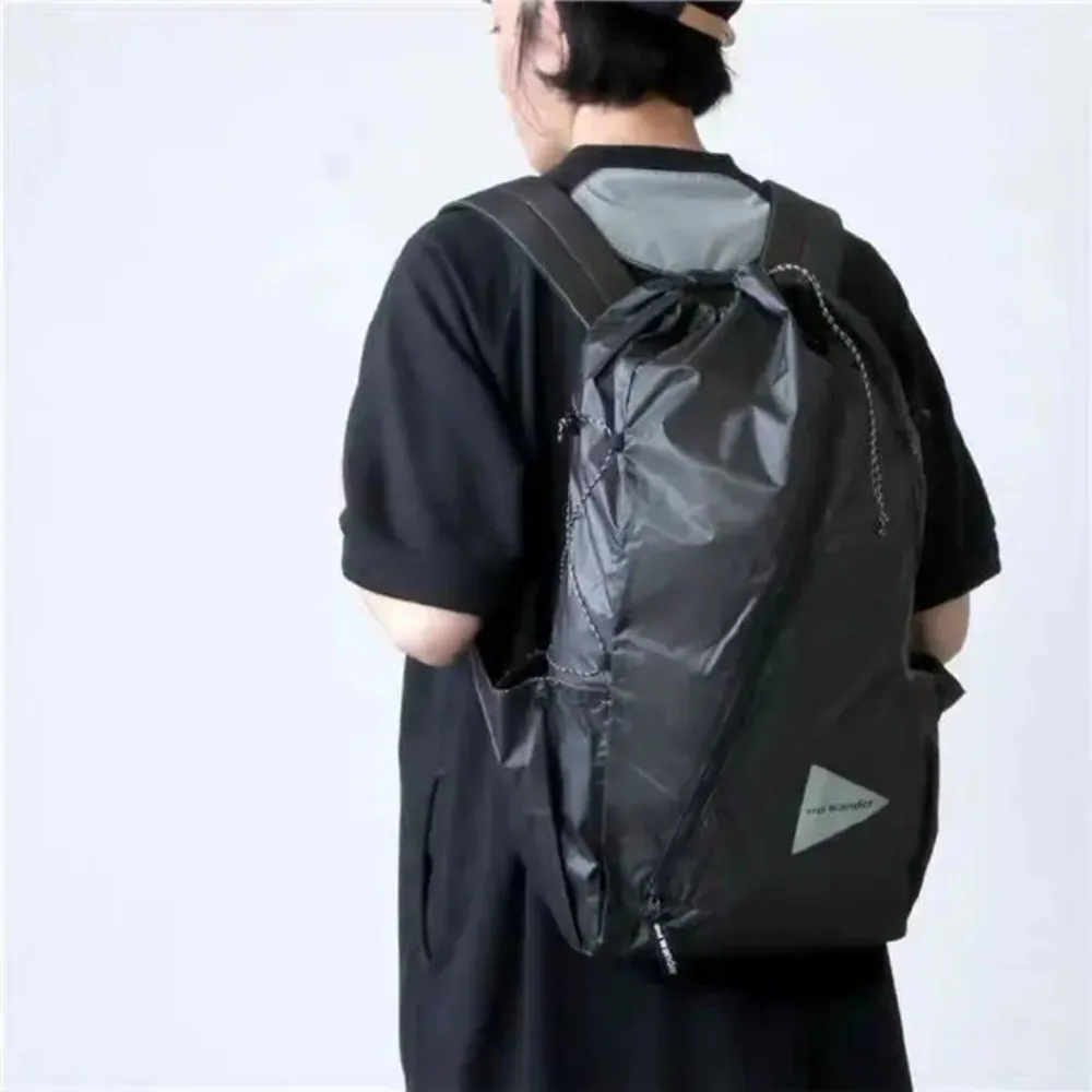 AND WANDER Lightweight Tech Daypack with Paper Texture Diagonal Zipper, Urban Outdoor Use
AND WANDER Lightweight Tech Daypack with Paper Texture Diagonal Zipper, Urban Outdoor Use