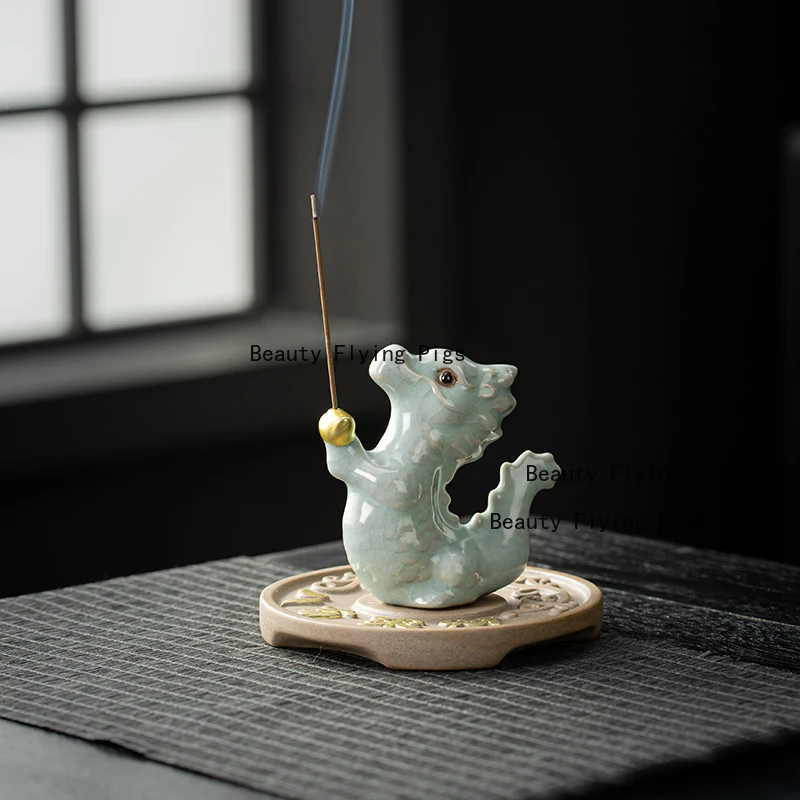 Handmade ceramic creative tea pet ornament small green dragon fragrance plug, household line fragrance plug
Handmade ceramic creative tea pet ornament small green dragon fragrance plug, household line fragrance plug