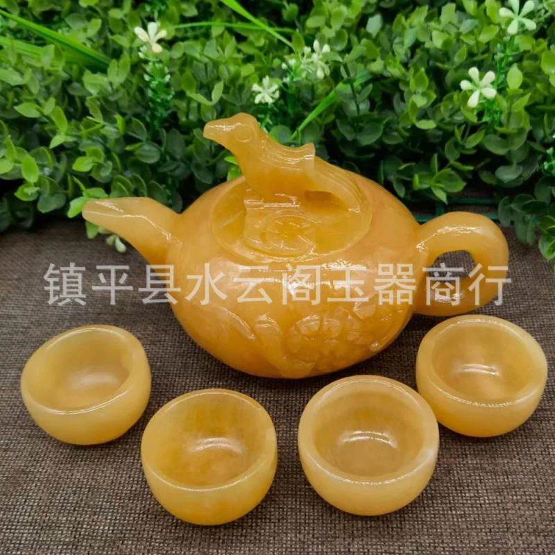 Yellow Jade Stone Ornament Jade Teapot Ornament Beige Jade Teapot Tea Set Jade Wine Pot One Teapot Four Wine Cups Craft
Yellow Jade Stone Ornament Jade Teapot Ornament Beige Jade Teapot Tea Set Jade Wine Pot One Teapot Four Wine Cups Craft