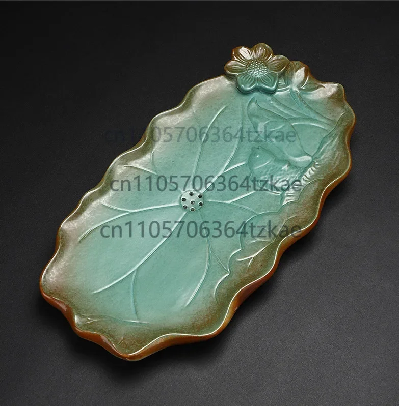 Chinese ceramic tea tray carved tea plate water reservoir serving tray creative
Chinese ceramic tea tray carved tea plate water reservoir serving tray creative