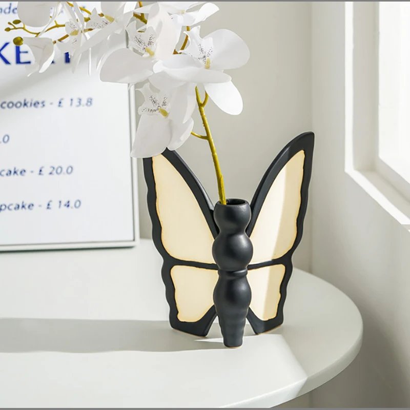 Creative Ceramic Butterfly Vase Black Premium Hydroponic Flower Arrangement Container Dining Table Ceramic Butterfly Flower Vase
Creative Ceramic Butterfly Vase Black Premium Hydroponic Flower Arrangement Container Dining Table Ceramic Butterfly Flower Vase