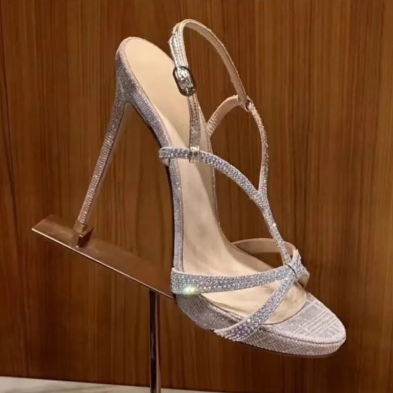Exquisite 2026 new summer slim heel thick sole waterproof table buckle sandals with women's rhinestone French super high heels
Exquisite 2026 new summer slim heel thick sole waterproof table buckle sandals with women's rhinestone French super high heels