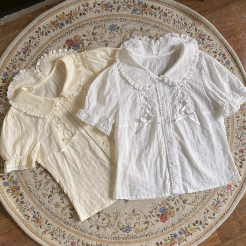 2025 Doll Collar Japanese Cute Lolita Sweet Summer Blouse Solid White Puff Short Sleeve Subcultural Fairycore Casual Shirt
2025 Doll Collar Japanese Cute Lolita Sweet Summer Blouse Solid White Puff Short Sleeve Subcultural Fairycore Casual Shirt