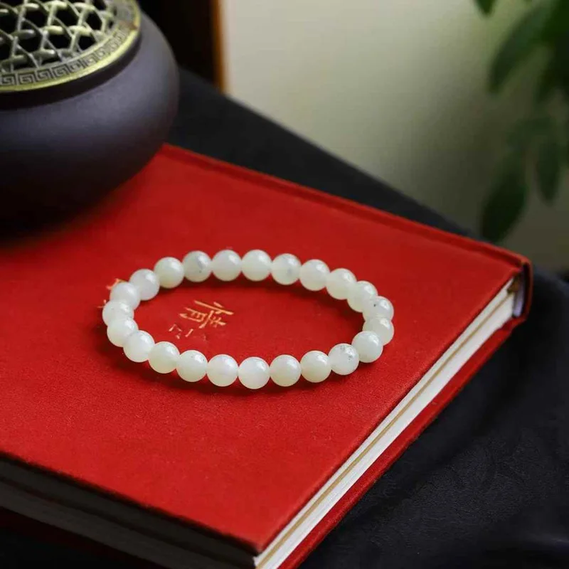 Natural Hetian Russian Blue And White Old Material Simple Round Jade Smooth Bracelet
Natural Hetian Russian Blue And White Old Material Simple Round Jade Smooth Bracelet