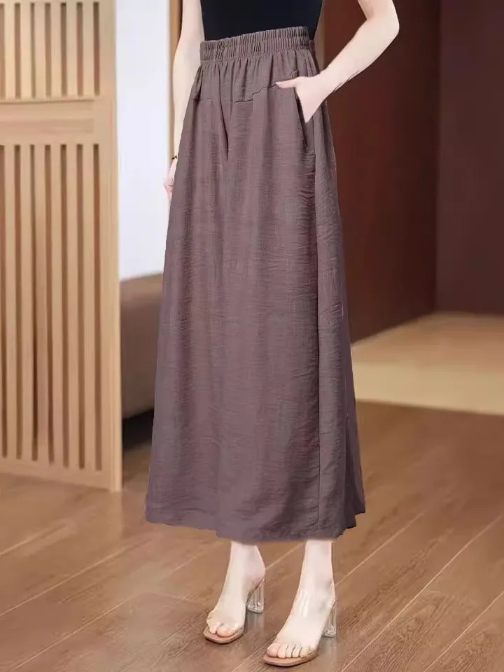 New Ice Silk Pleated Women's Pants Summer Thin Loose Slim High Waist Mid-aged Nine-point Wide-leg Skirt Casual Pants Skirt
New Ice Silk Pleated Women's Pants Summer Thin Loose Slim High Waist Mid-aged Nine-point Wide-leg Skirt Casual Pants Skirt