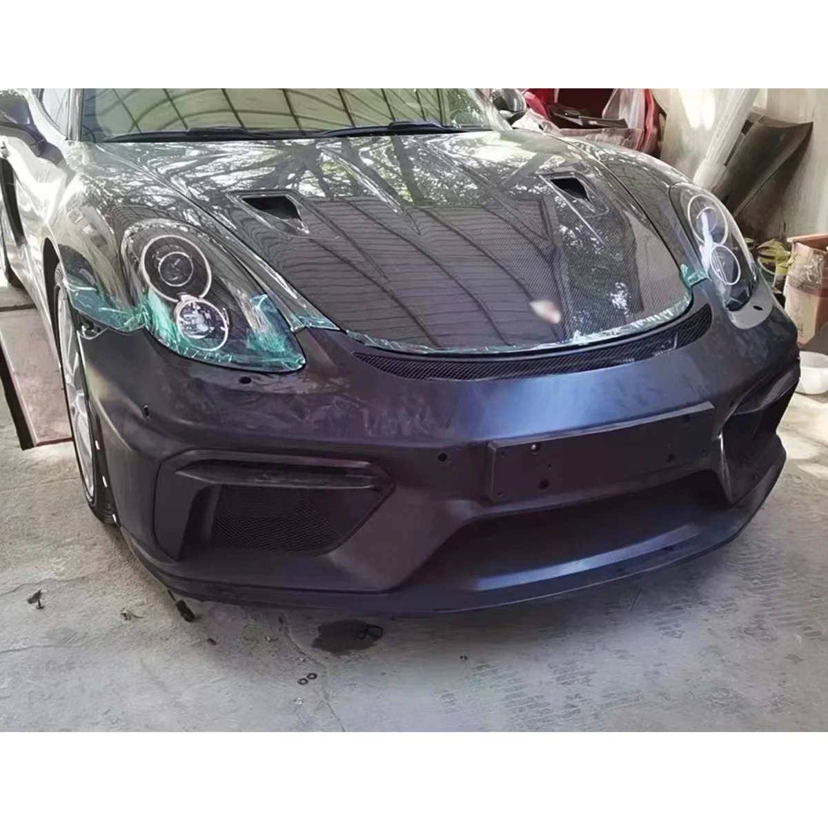 PP Plastic Front Bumper Parts Body Kits for Cayman 718/981facelift to GT4 Appearance.
PP Plastic Front Bumper Parts Body Kits for Cayman 718/981facelift to GT4 Appearance.