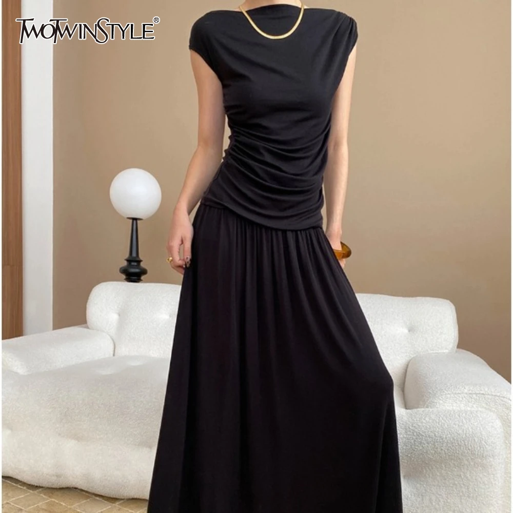 TWOTWINSTYLE Solid Two Piece Set for Women O Neck Sleeve T Shirt High Waist Loose Skirt Minimalist Sets Female New
TWOTWINSTYLE Solid Two Piece Set for Women O Neck Sleeve T Shirt High Waist Loose Skirt Minimalist Sets Female New