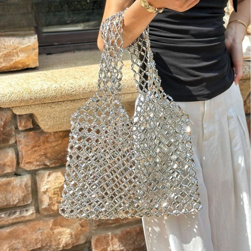 High-end Hollow-out Large-capacity Tote Metal Shiny Ineffectual Hand-woven Beaded Underarm Handbag
High-end Hollow-out Large-capacity Tote Metal Shiny Ineffectual Hand-woven Beaded Underarm Handbag