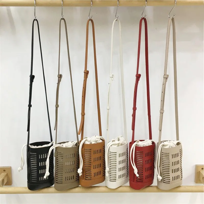 Spring and Summer 2024 New Niche Retro Hollow Mini Bucket Bag Shoulder Crossbody Mobile Phone Small Bag
Spring and Summer 2024 New Niche Retro Hollow Mini Bucket Bag Shoulder Crossbody Mobile Phone Small Bag
