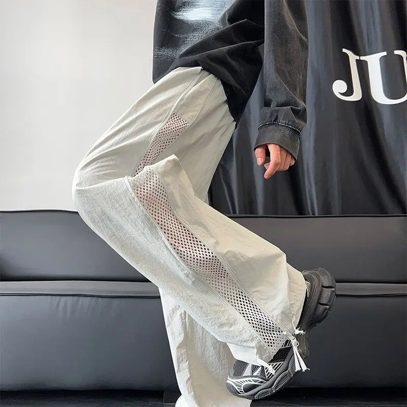 Mesh Stitching Landing Paratrooper Pants Summer Thin Overalls American Zipper Charging Casual Trousers Baggy Straight Trousers
Mesh Stitching Landing Paratrooper Pants Summer Thin Overalls American Zipper Charging Casual Trousers Baggy Straight Trousers