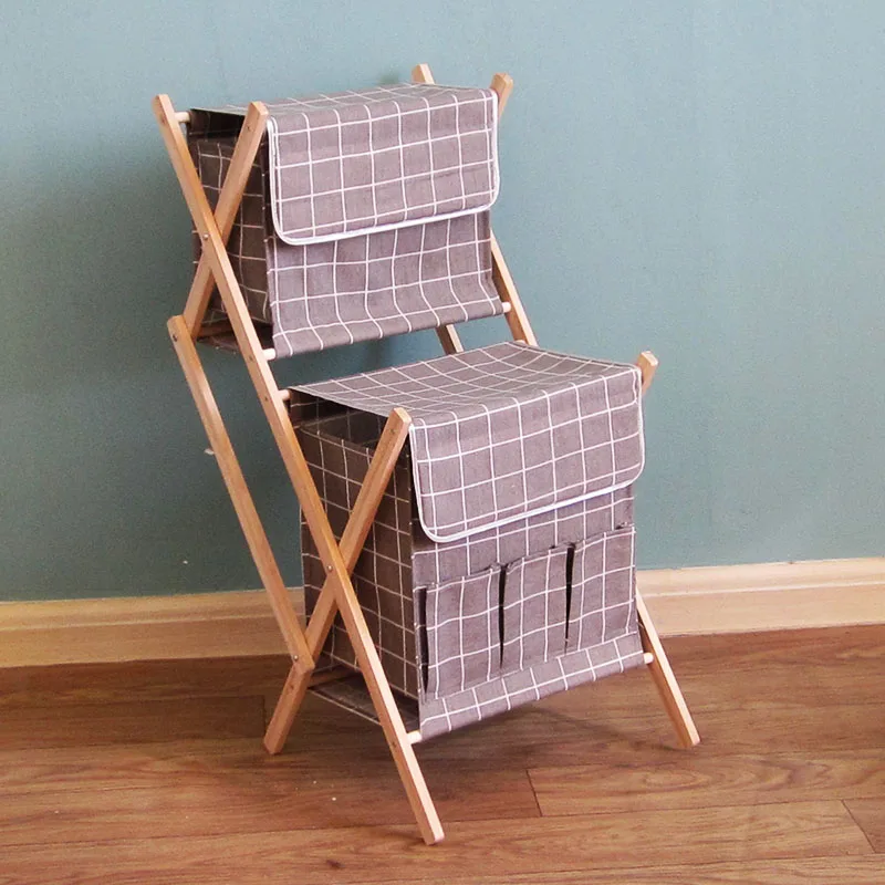 Fabric storage basket, double-folded solid wood storage rack, stationery, newspaper storage frame, underwear,clothes basket
Fabric storage basket, double-folded solid wood storage rack, stationery, newspaper storage frame, underwear,clothes basket