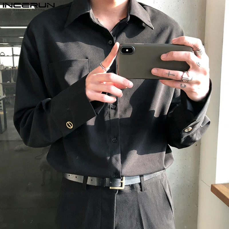 2024 INCERUN Men Causal Loose Solid Color Shirts Lapel Collar Simple Metal Buttons Tops Commuting Long Sleeve Elegant Blouses
2024 INCERUN Men Causal Loose Solid Color Shirts Lapel Collar Simple Metal Buttons Tops Commuting Long Sleeve Elegant Blouses