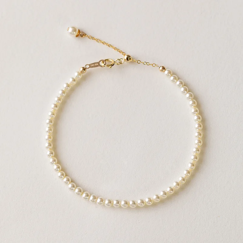 Thin Pearl Bracelet With Gold Bead Pendant Stackable Niche Design Elegant Luxury Delicate Layering Hand Jewelry For Women
Thin Pearl Bracelet With Gold Bead Pendant Stackable Niche Design Elegant Luxury Delicate Layering Hand Jewelry For Women