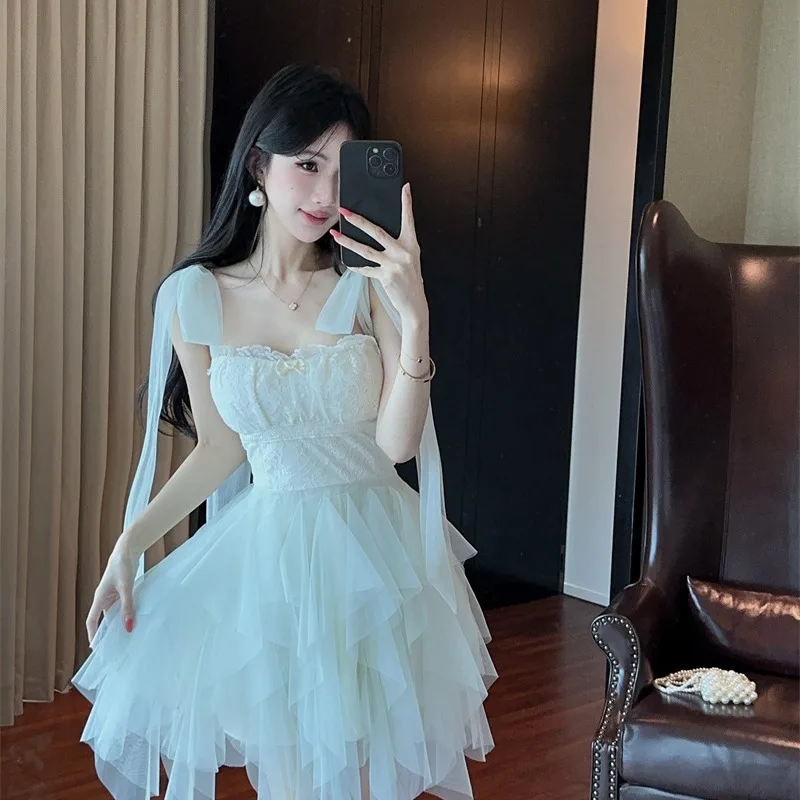 Beach Vacation Style Mesh Strap Dress Halter Neck Long Fairy Skirt Pure Desire High Waist A-Line Midi Dress for Women 2026 Su...
Beach Vacation Style Mesh Strap Dress Halter Neck Long Fairy Skirt Pure Desire High Waist A-Line Midi Dress for Women 2026 Su...