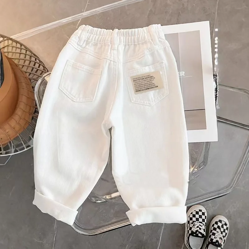 Korean Children's Clothing Boys and Girls White Jeans 2025 Autumn New hildren's Casual Pants Girls Fashionable Pants
Korean Children's Clothing Boys and Girls White Jeans 2025 Autumn New hildren's Casual Pants Girls Fashionable Pants