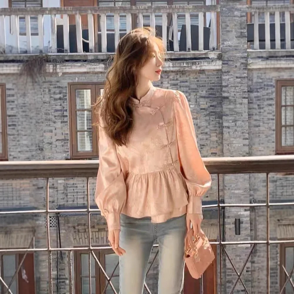 2025 early spring new Chinese style women's clothing small pink button shirt top design sense niche
2025 early spring new Chinese style women's clothing small pink button shirt top design sense niche