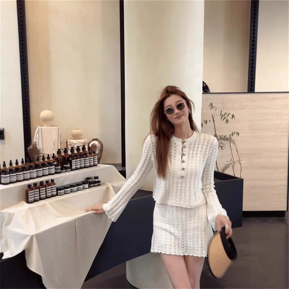 Knitted Hollow Out Long Sleeve Top and Mini Skirt Set Elegant Two Piece Outfit for Women
Knitted Hollow Out Long Sleeve Top and Mini Skirt Set Elegant Two Piece Outfit for Women