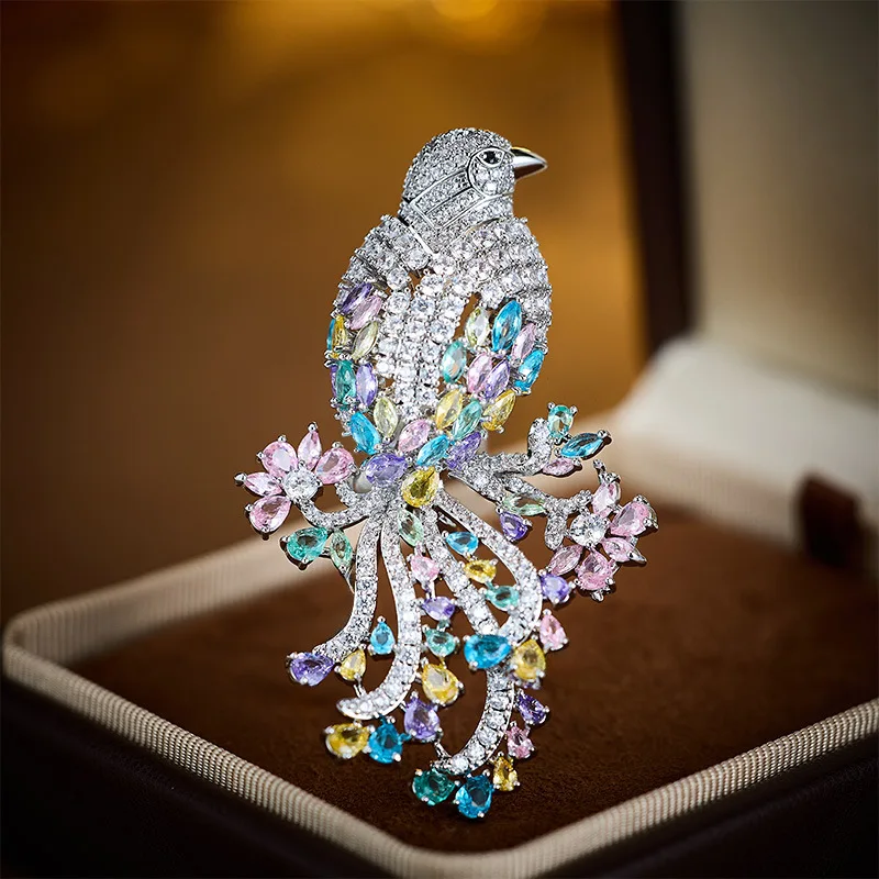 A high-end and luxurious zircon bird brooch inlaid with colored gemstones, an elegant and upscale suit pin accessory
A high-end and luxurious zircon bird brooch inlaid with colored gemstones, an elegant and upscale suit pin accessory