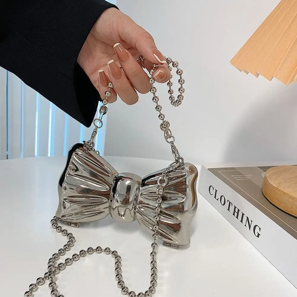 Korean Style Metal Mini Bow Crossbody Bags Irregular Shape Elegant Banquet Chain Bag Small Wallet Shinny Evening Clutch Bag
Korean Style Metal Mini Bow Crossbody Bags Irregular Shape Elegant Banquet Chain Bag Small Wallet Shinny Evening Clutch Bag