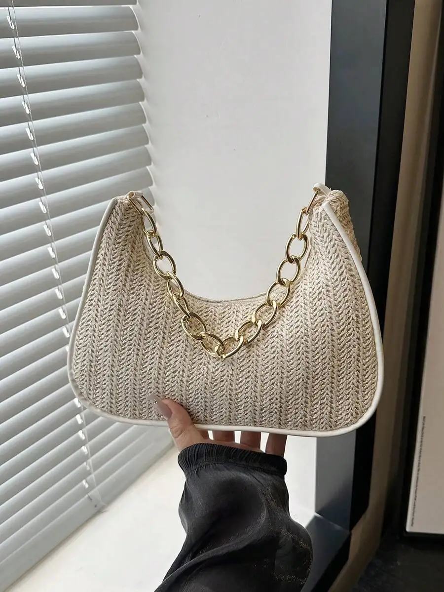 Cream Woven Straw Crescent Bag with Gold Chain Strap for Summer Casual Use
Cream Woven Straw Crescent Bag with Gold Chain Strap for Summer Casual Use