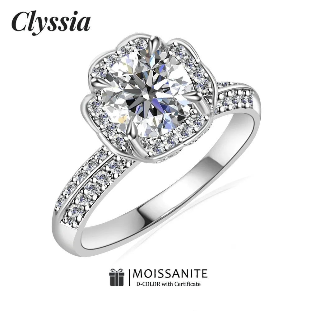 CLYSSIA стерлингового серебра 925 пробы, белое золото 18 карат, кольцо с муассанитом, ювелирные изделия с подушкой для женщин, роскошное обручальное кольцо, подарок
CLYSSIA стерлингового серебра 925 пробы, белое золото 18 карат, кольцо с муассанитом, ювелирные изделия с подушкой для женщин, роскошное обручальное кольцо, подарок