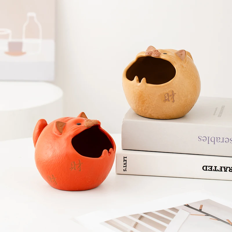 Ceramic ashtray featuring a cute cartoon cat to prevent dust flying. Unique and trendy
Ceramic ashtray featuring a cute cartoon cat to prevent dust flying. Unique and trendy