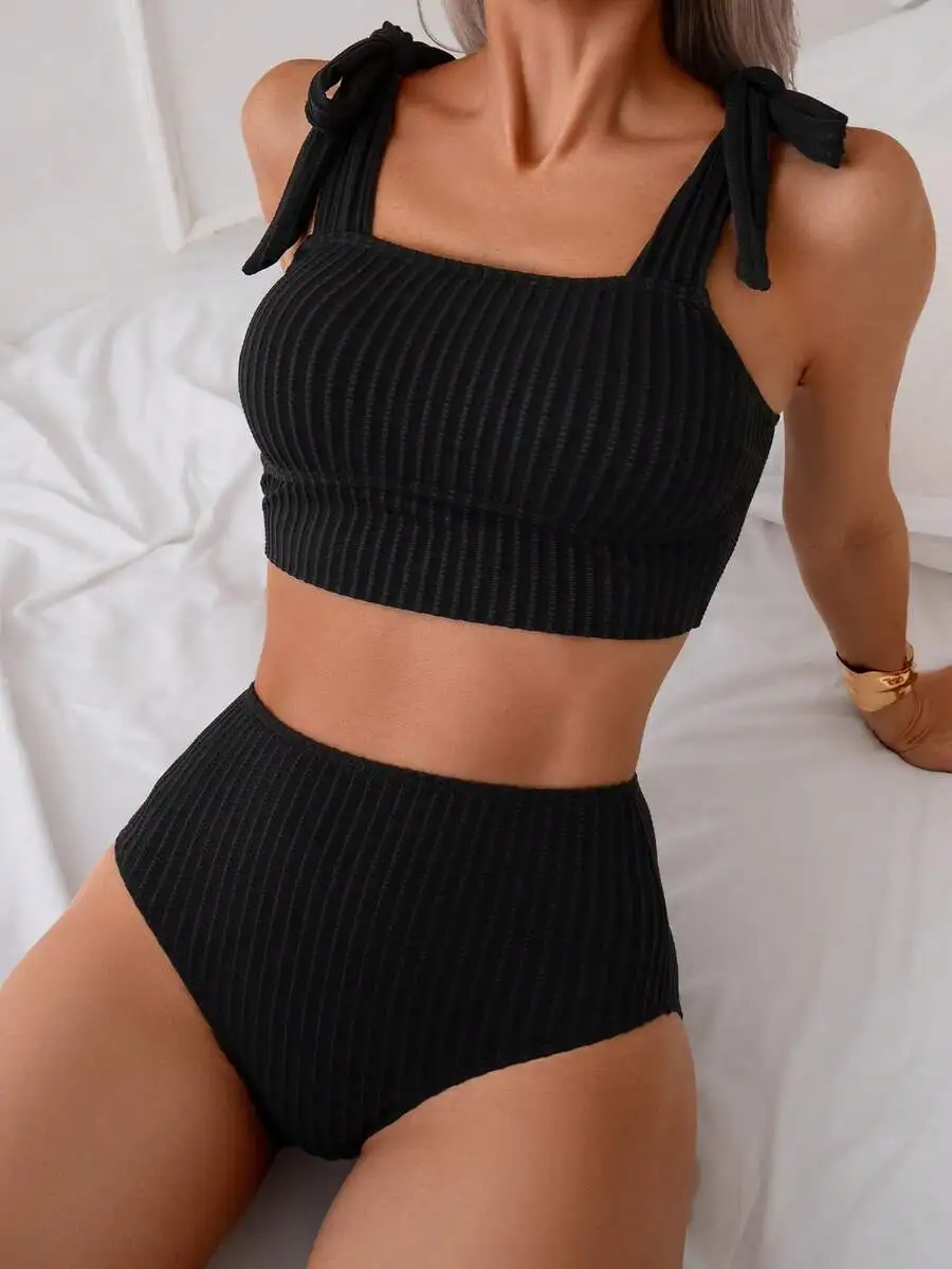Black Ribbed Two-Piece Tankini With Adjustable Tie-Shoulder Detail For Summer Beach Holiday Wear
Black Ribbed Two-Piece Tankini With Adjustable Tie-Shoulder Detail For Summer Beach Holiday Wear