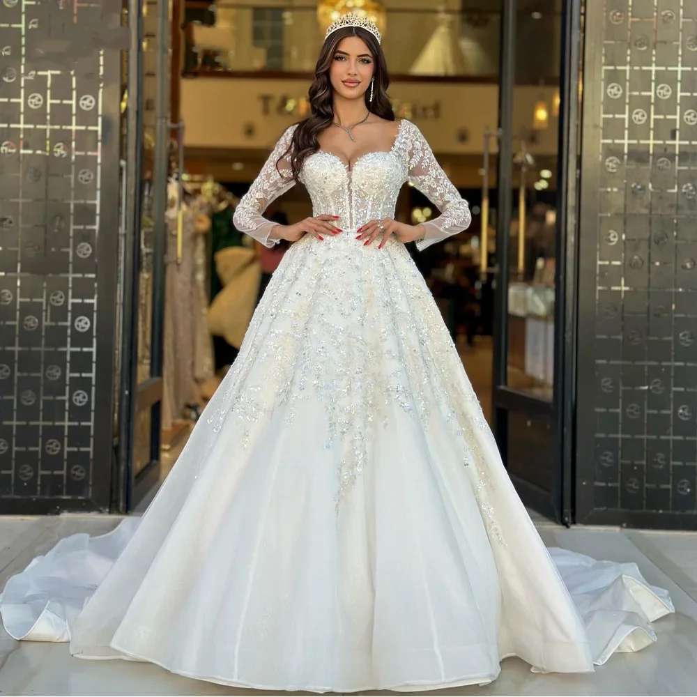 Роскошные женские длинные свадебные платья трапециевидной формы с рукавами по индивидуальному заказу, атласные вечерние платья богини, свадебные платья Vestidos De Novia
Роскошные женские длинные свадебные платья трапециевидной формы с рукавами по индивидуальному заказу, атласные вечерние платья богини, свадебные платья Vestidos De Novia