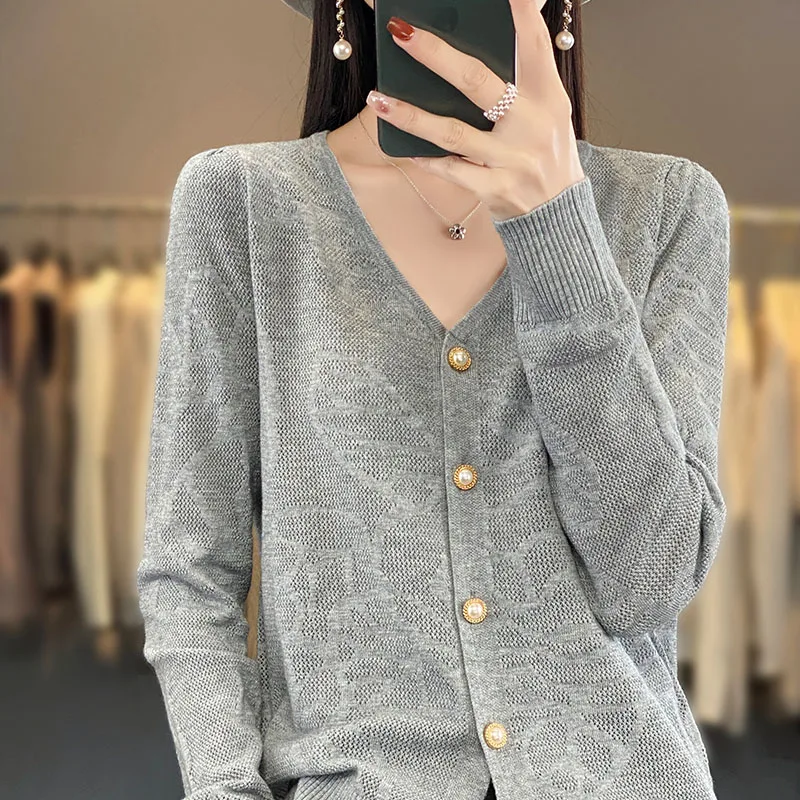 Spring and Autumn Knitted Cardigan Wool V-neck Pullover Single breasted Minimalist Slim Fit Women's Solid Color Hollow Block Sw
Spring and Autumn Knitted Cardigan Wool V-neck Pullover Single breasted Minimalist Slim Fit Women's Solid Color Hollow Block Sw
