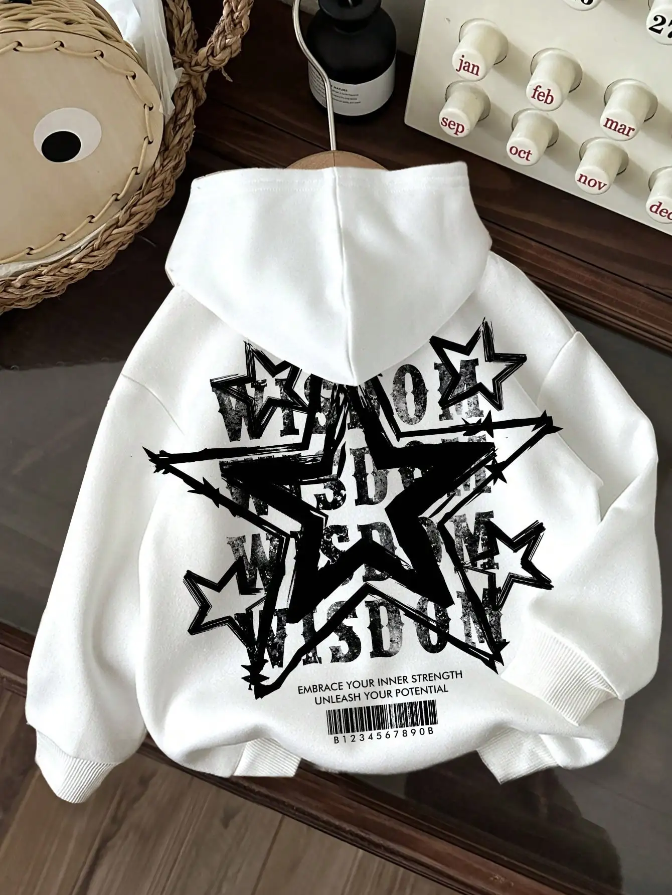 White Loose Fit Graphic Hoodie with Star & Text Print for Kids
White Loose Fit Graphic Hoodie with Star & Text Print for Kids
