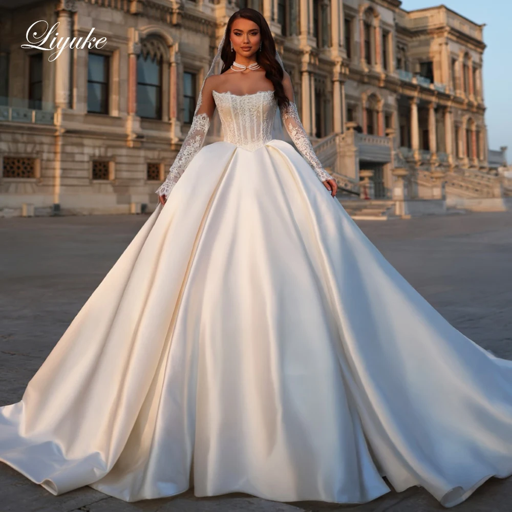 Свадебное платье Liyuke на заказ: простое, с вырезом-лодочкой, пышное, со съемными рукавами, с открытыми плечами, из атласа
Свадебное платье Liyuke на заказ: простое, с вырезом-лодочкой, пышное, со съемными рукавами, с открытыми плечами, из атласа