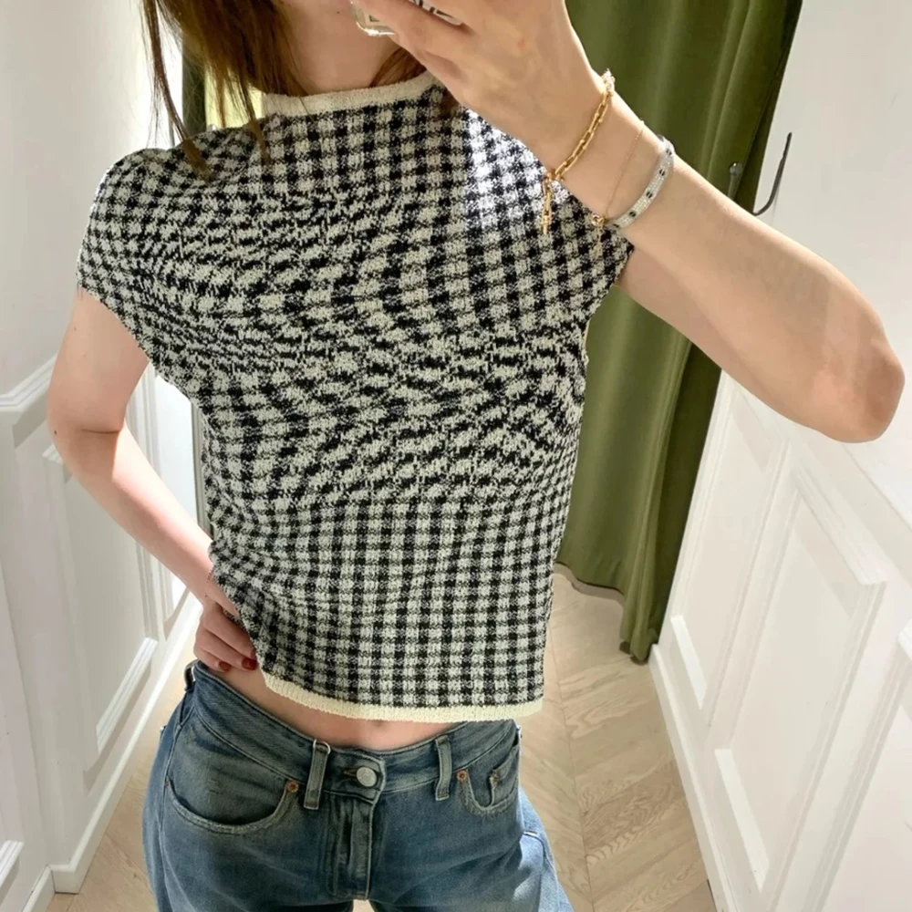 Women's Y2K Commuter Peplum round Neck Vest T-Shirt Black White Check Illusion Top Visual Transformation Summer New 2025
Women's Y2K Commuter Peplum round Neck Vest T-Shirt Black White Check Illusion Top Visual Transformation Summer New 2025