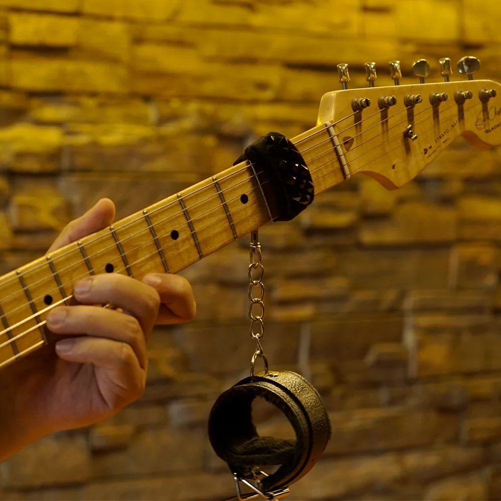 Punk Style Rivet Leather Guitar & Bass String Mute, Adjustable Noise Reducer for Electric Instruments
Punk Style Rivet Leather Guitar & Bass String Mute, Adjustable Noise Reducer for Electric Instruments