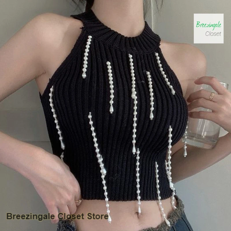 French small fragrance sweet off-the-shoulder sweater women's spring and summer new vest pure desire hot girl design sense top.
French small fragrance sweet off-the-shoulder sweater women's spring and summer new vest pure desire hot girl design sense top.