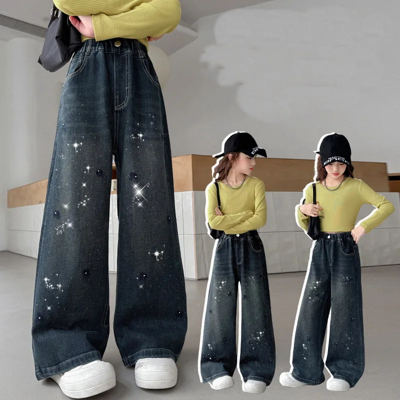 Детские уличные джинсы высокой моды с вышивкой стразами и цветами для девочек, уличная одежда, джинсовые брюки с цветными кристаллами, детские брюки
Детские уличные джинсы высокой моды с вышивкой стразами и цветами для девочек, уличная одежда, джинсовые брюки с цветными кристаллами, детские брюки