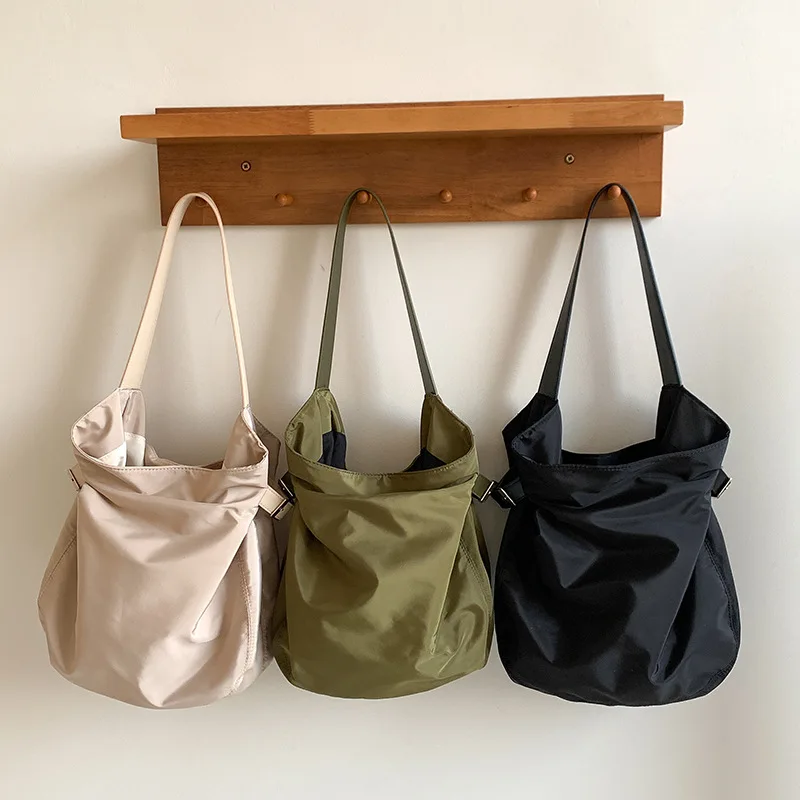 Luxury Designer Black Tote Bag Women Armpit Bag New Nylon Bucket Fashion Solid Soft Shoulder Bag Purses and Handbags
Luxury Designer Black Tote Bag Women Armpit Bag New Nylon Bucket Fashion Solid Soft Shoulder Bag Purses and Handbags