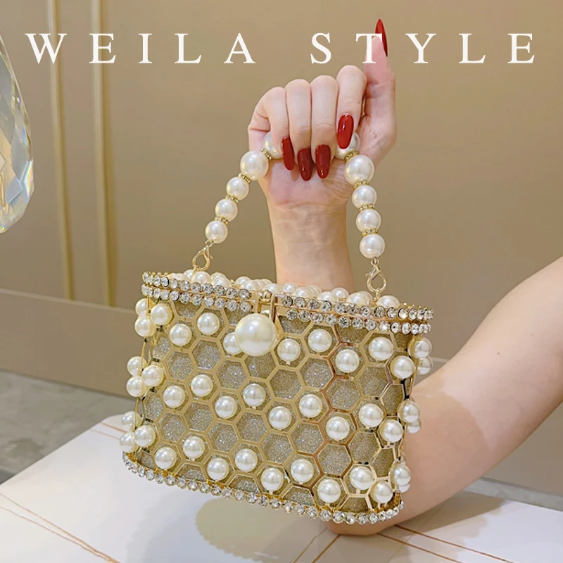 Vintage cutout metal mesh banquet bag, French rhinestone bird cage purse, Pearl bucket bag, Sparkling haute party bag.
Vintage cutout metal mesh banquet bag, French rhinestone bird cage purse, Pearl bucket bag, Sparkling haute party bag.