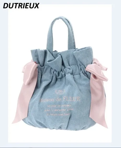 Japanese Style Ribbon Bow Crossbody Hand Holding Dual-Use Bag for ladies Fashion Casual Handbags 2025 New Women's Hand Bags
Japanese Style Ribbon Bow Crossbody Hand Holding Dual-Use Bag for ladies Fashion Casual Handbags 2025 New Women's Hand Bags
