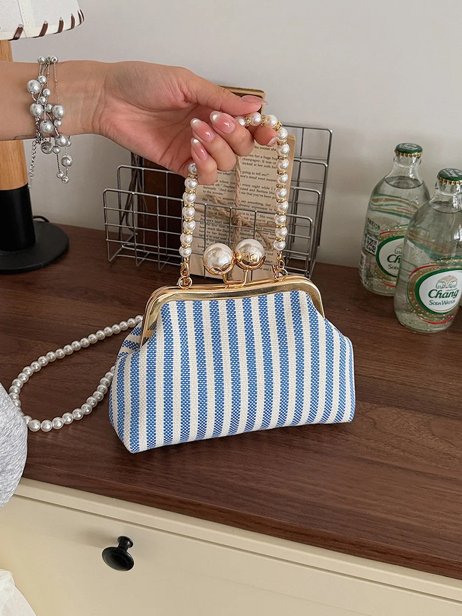 Fashionable Striped Woven Bags for Women Summer Versatile Exquisite Pearls Chains Messenger Bag 2026 New Casual Beach Handbags
Fashionable Striped Woven Bags for Women Summer Versatile Exquisite Pearls Chains Messenger Bag 2026 New Casual Beach Handbags